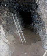 Leiter in der Höhle